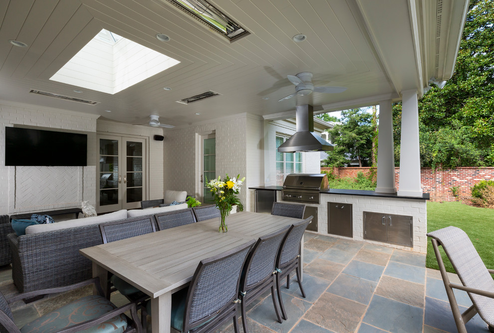Inspiration for a traditional backyard verandah in Charlotte with a roof extension.