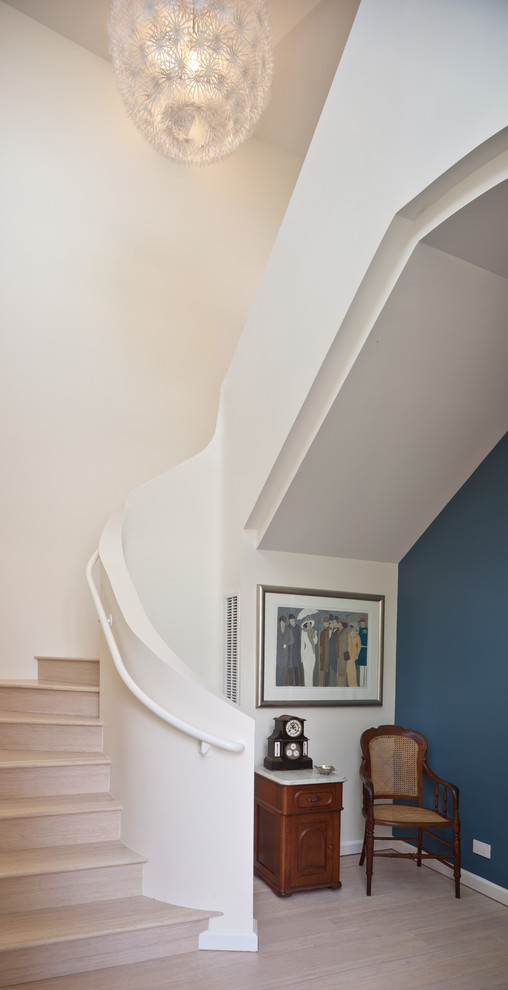 Design ideas for a contemporary curved staircase in New Orleans.