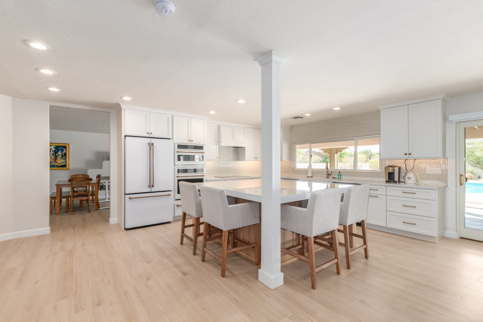 Inspiration for a transitional porcelain tile and multicolored floor kitchen remodel in Phoenix with multicolored backsplash, mosaic tile backsplash, colored appliances and white countertops