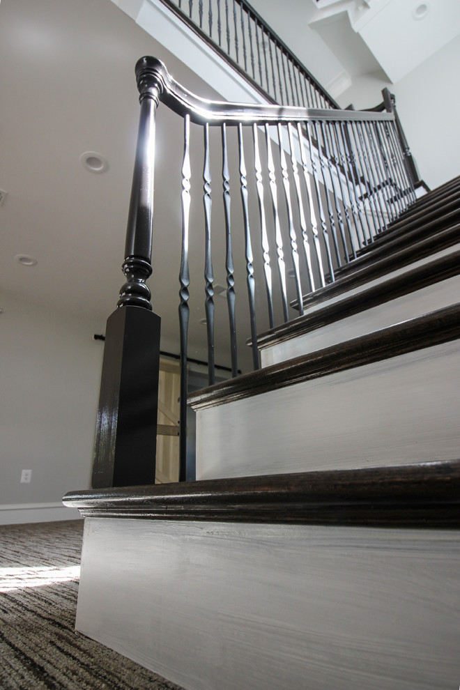 Staircase - large transitional wooden l-shaped mixed material railing staircase idea in DC Metro with painted risers