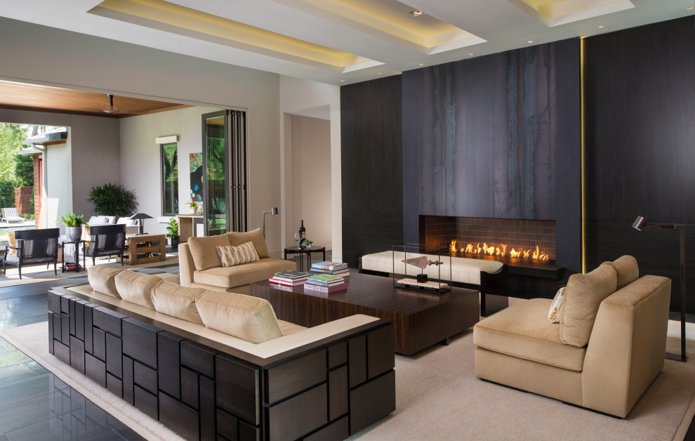 Photo of a contemporary open concept living room in Dallas with grey walls.