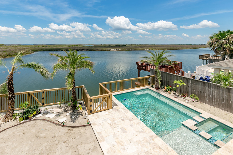 Transitional pool photo in Austin