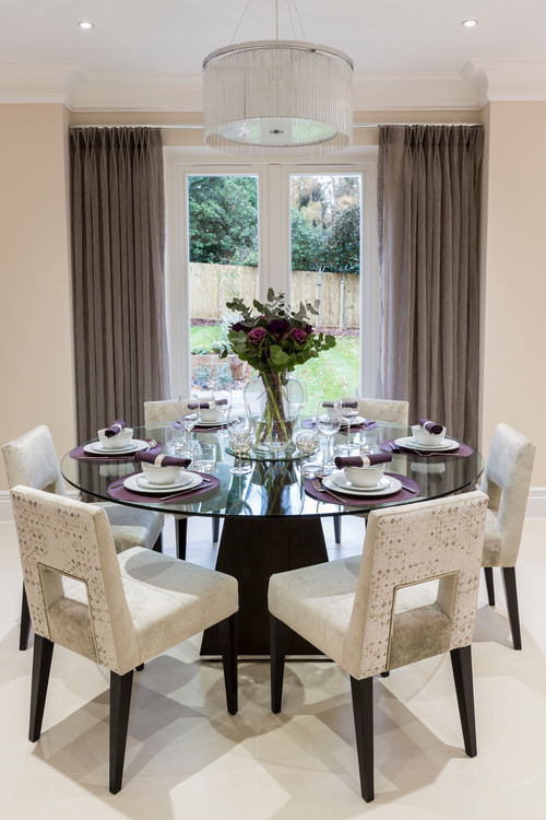 transitional space with soft draperies and chairs
