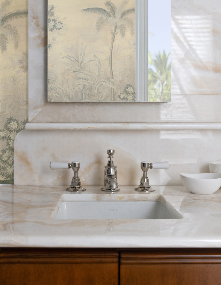 Example of a transitional home design design in Miami
