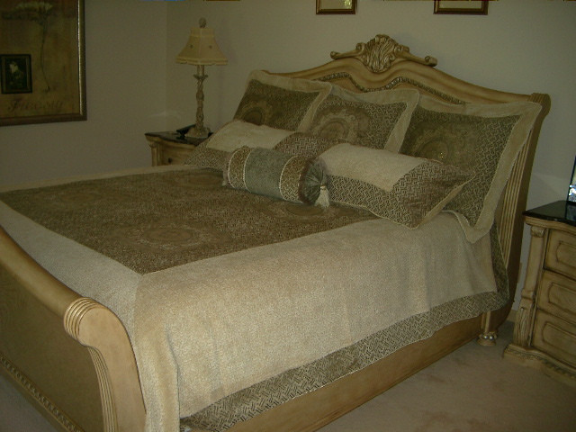 Example of a transitional bedroom design in Calgary