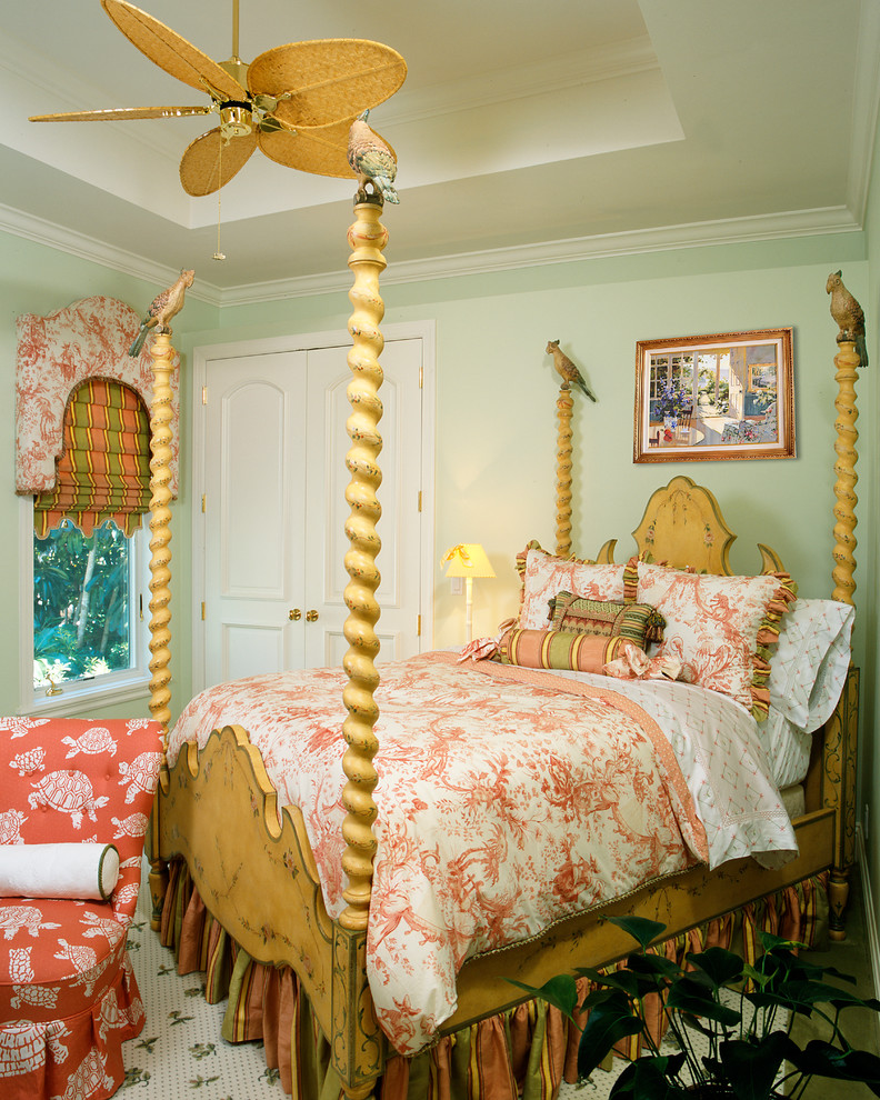 Photo of a mid-sized tropical kids' bedroom for girls in Miami with green walls and carpet.