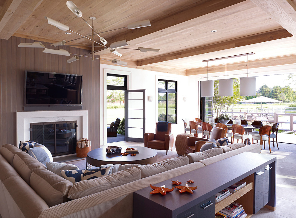 Photo of a beach style family room in New York.