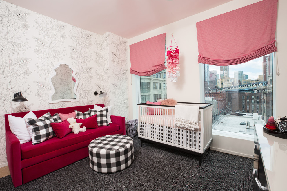 Contemporary nursery in New York with carpet for girls.