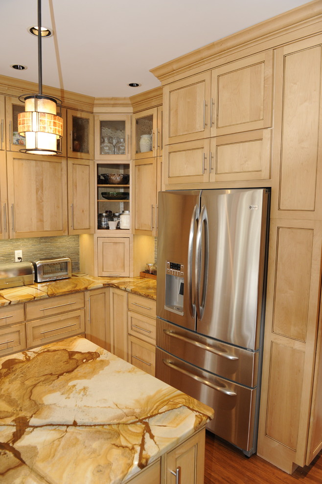 Mid-sized transitional u-shaped light wood floor eat-in kitchen photo in Baltimore with a farmhouse sink, beaded inset cabinets, light wood cabinets, onyx countertops, stainless steel appliances and an island