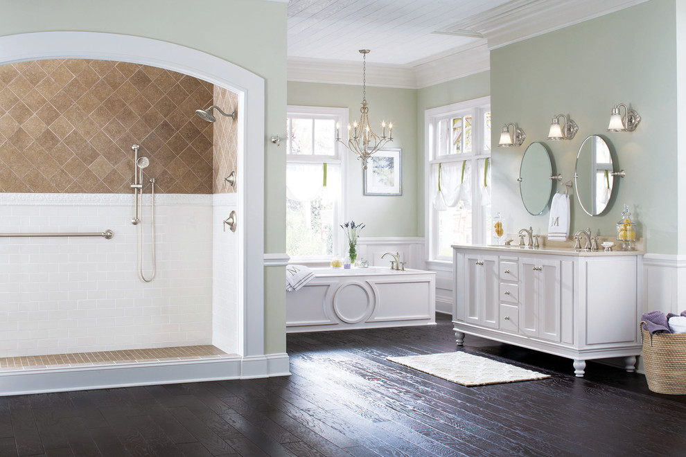Design ideas for a large transitional master wet room bathroom in Austin with a console sink, recessed-panel cabinets, white cabinets, white walls, dark hardwood floors, a drop-in tub, a two-piece toilet, white tile, subway tile and an open shower.