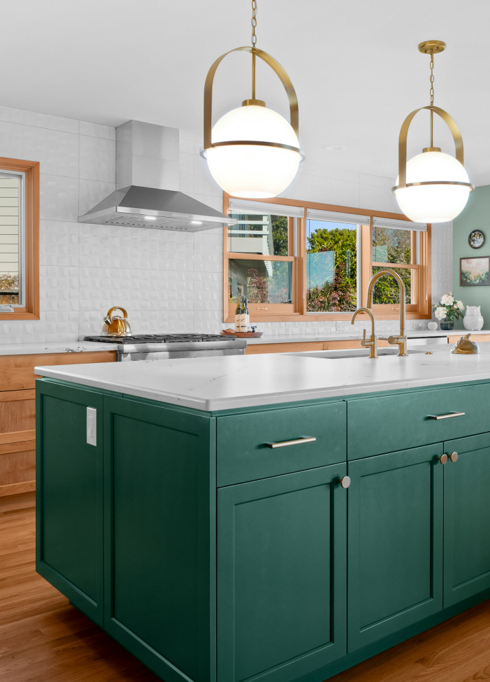 Kitchen - transitional l-shaped medium tone wood floor kitchen idea with shaker cabinets, white backsplash, an island and white countertops