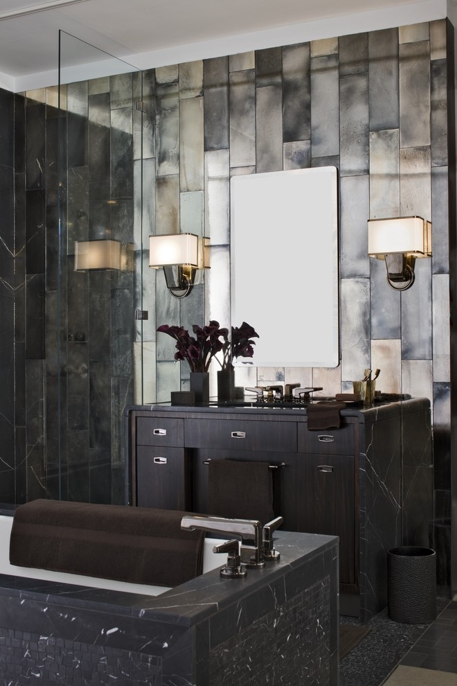 Photo of a contemporary bathroom in Milwaukee with mosaic tile.