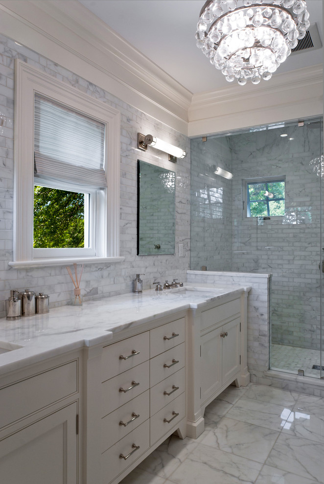 Photo of a traditional bathroom in New York with subway tile.