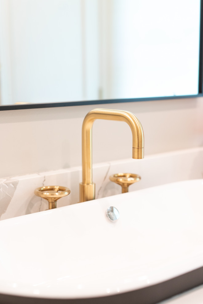 Golden Shower Head in Modern Bathroom with Tiled Walls