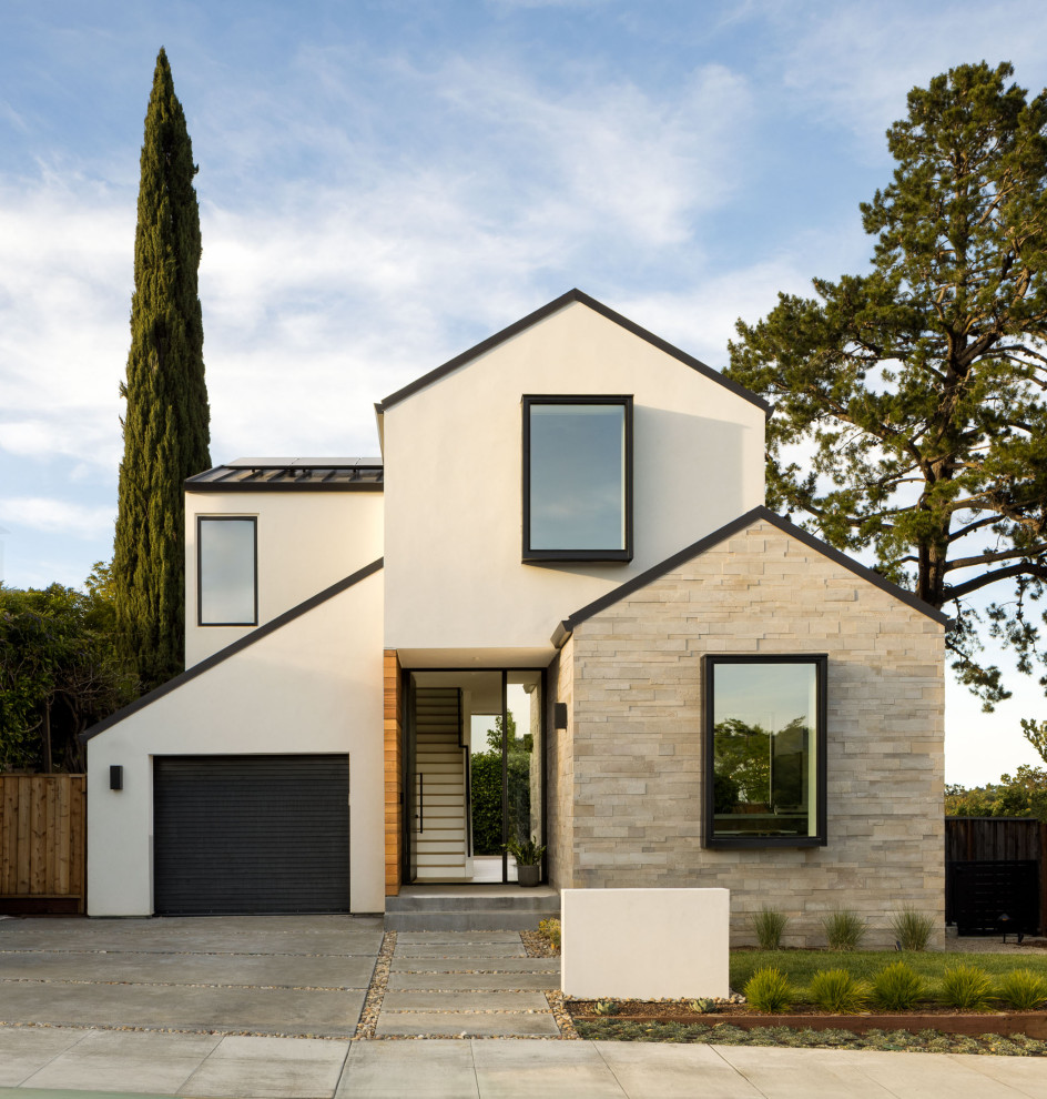 Inspiration for a contemporary white two-story gable roof remodel in San Francisco