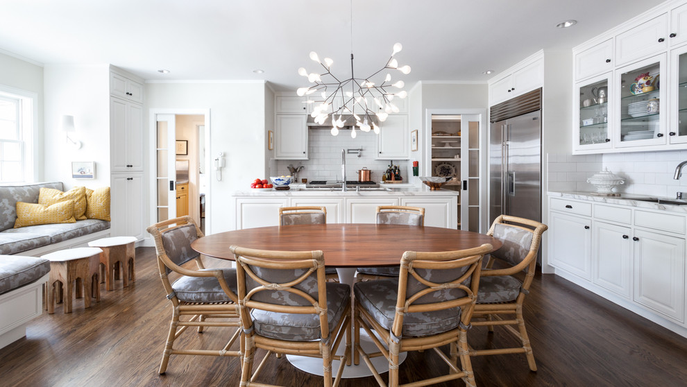 Large transitional kitchen/dining combo in Sacramento with dark hardwood floors and white walls.