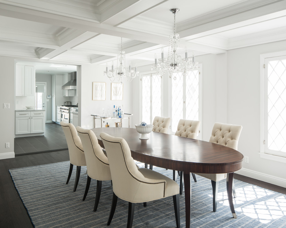 This is an example of a mid-sized transitional separate dining room in Los Angeles with grey walls and dark hardwood floors.