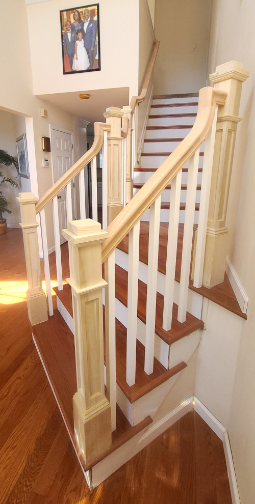 Design ideas for a small traditional wood l-shaped wood railing staircase in New York with wood risers.