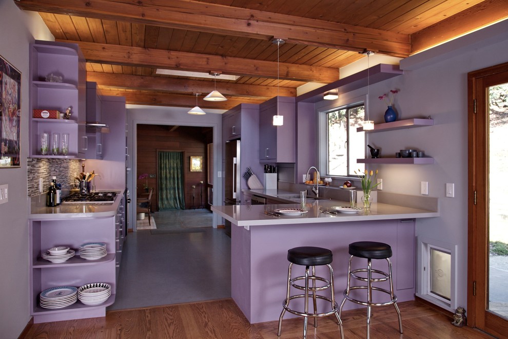 Mid-sized contemporary galley eat-in kitchen in San Francisco with an undermount sink, flat-panel cabinets, purple cabinets, quartz benchtops, multi-coloured splashback, glass tile splashback, stainless steel appliances, a peninsula, grey floor and purple benchtop.