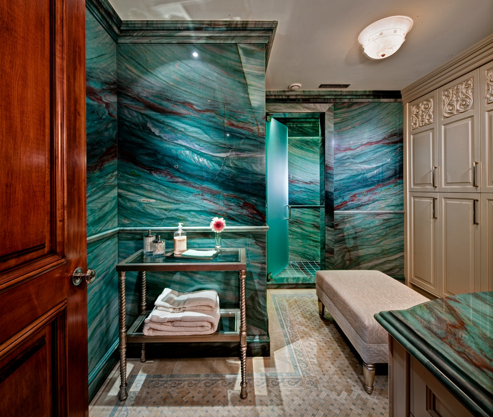 Expansive traditional bathroom in Detroit with an alcove shower, blue tile, an undermount sink, beige cabinets, marble benchtops, a two-piece toilet, stone slab, green walls, mosaic tile floors and raised-panel cabinets.