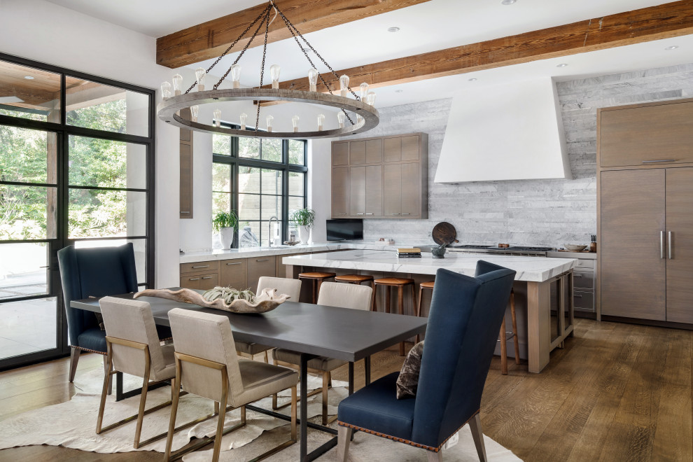 This is an example of a contemporary open plan dining in Austin with white walls, medium hardwood floors and no fireplace.