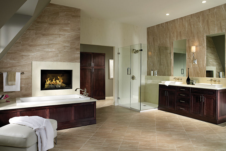 Mid-sized contemporary master bathroom in New York with shaker cabinets, dark wood cabinets, a drop-in tub, a corner shower, white tile, white walls, ceramic floors, a drop-in sink and tile benchtops.