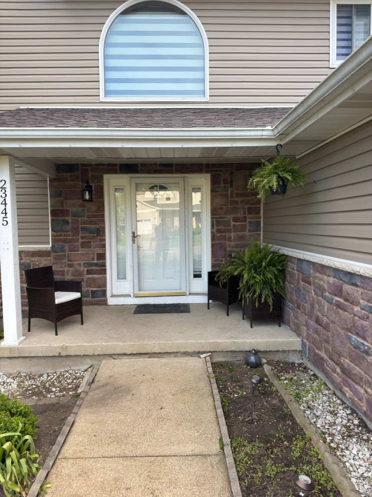 Large minimalist front door photo with a white front door