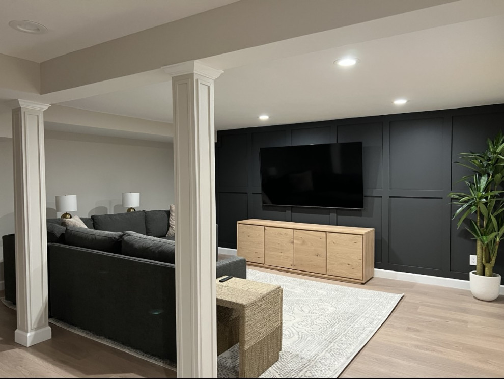Ispirazione per un soggiorno contemporaneo di medie dimensioni con pavimento in vinile, TV a parete, pavimento beige e pannellatura
