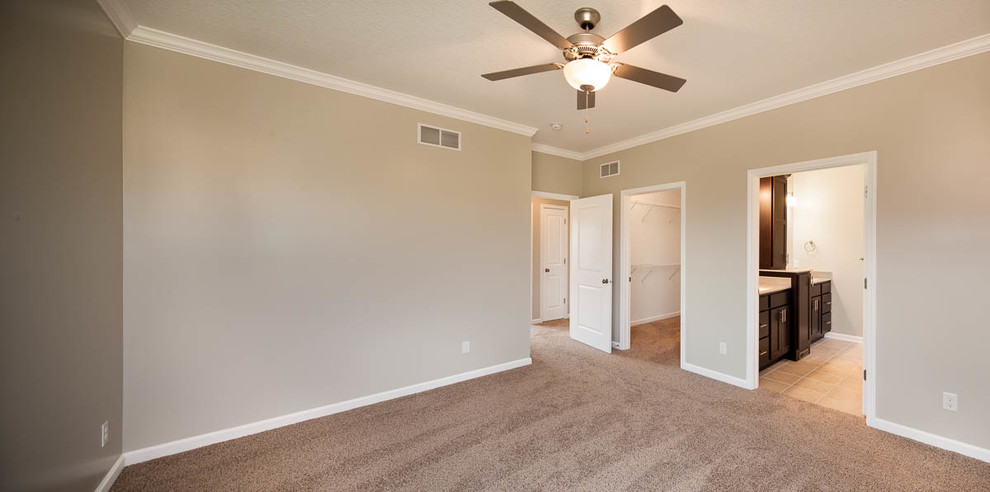 Large transitional guest carpeted bedroom photo in Chicago with gray walls and no fireplace