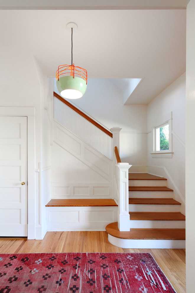 Design ideas for a transitional u-shaped staircase in Seattle.