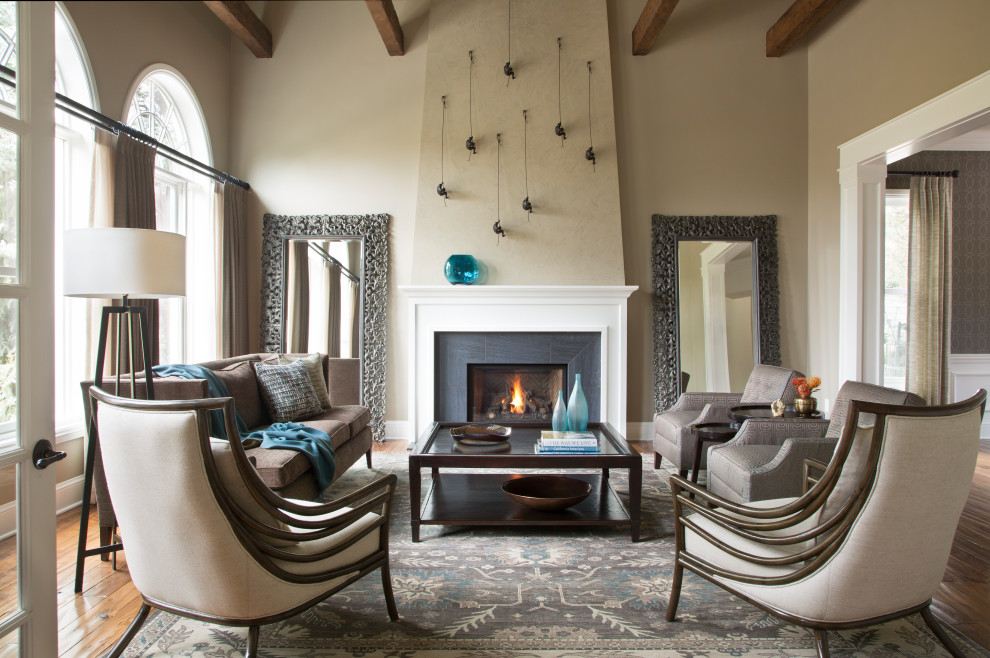 This is an example of a transitional living room in Denver.