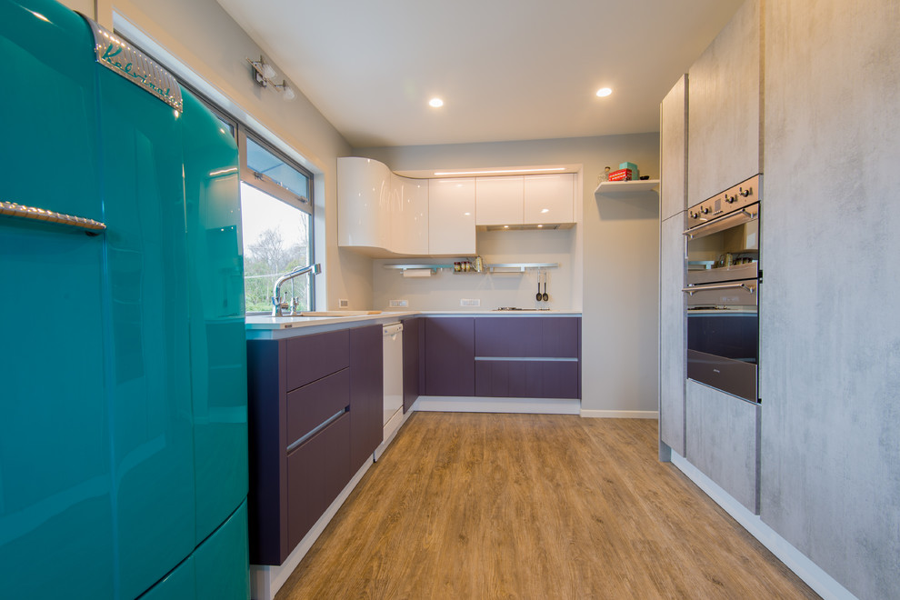 Mid-sized midcentury U-shaped kitchen pantry in Hamilton With a Double-bowl Sink, Flat-panel Cabinets, Purple Cabinets, Laminate Benchtops, Vinyl Floors and no Island.