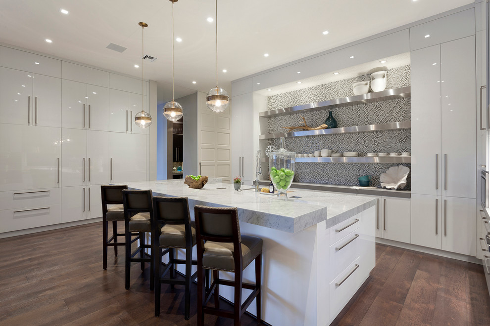 This is an example of a contemporary kitchen in Miami with flat-panel cabinets, white cabinets, multi-coloured splashback, mosaic tile splashback, dark hardwood floors and with island.