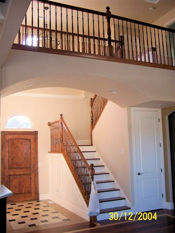 Inspiration for a mid-sized traditional wood u-shaped staircase in Salt Lake City with painted wood risers.