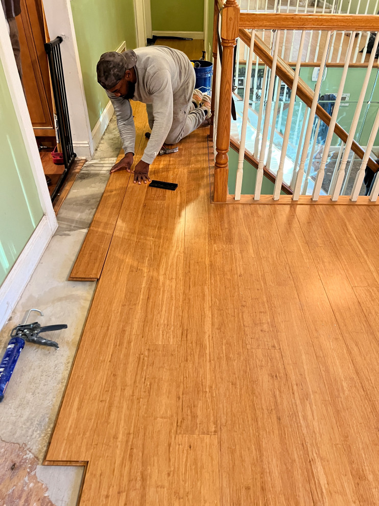 Engineered Hardwood Flooring Installation & Custom Stair Tread Renovation