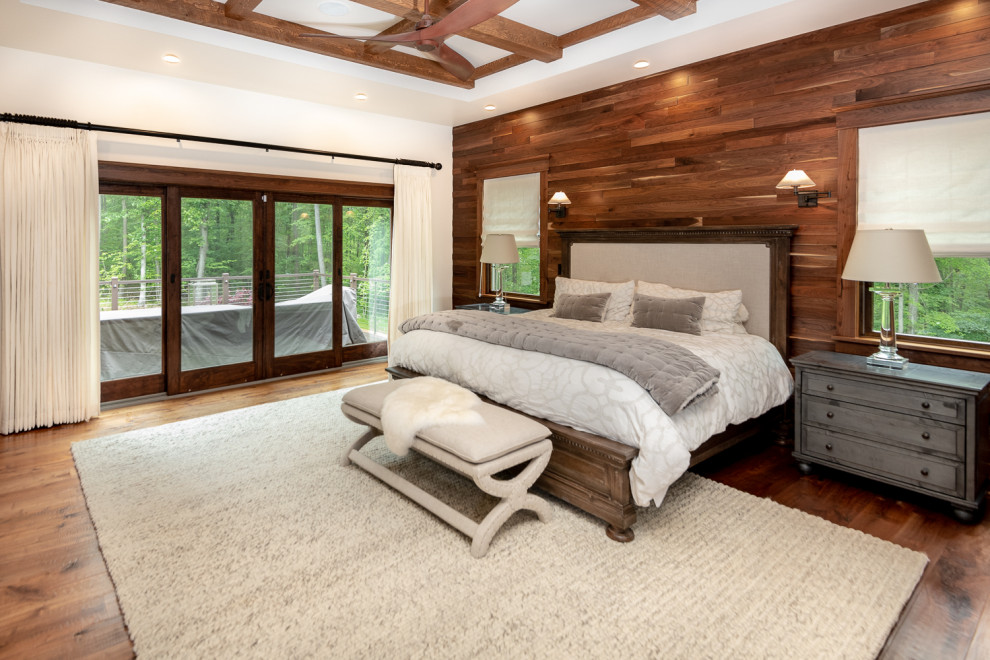 Design ideas for a country master bedroom in Other with white walls, medium hardwood floors and brown floor.