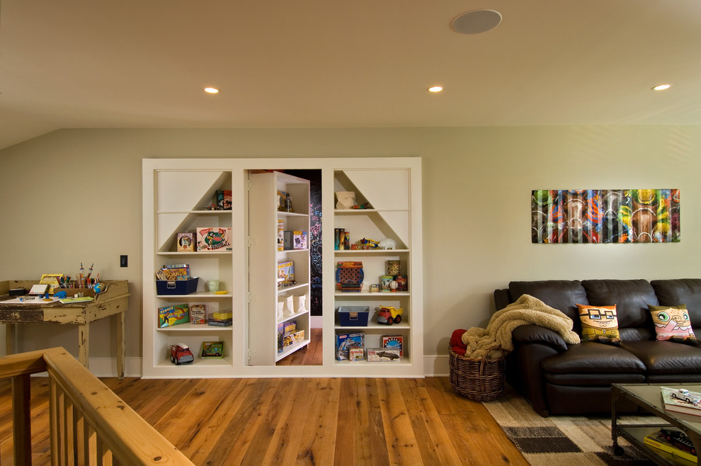 Inspiration for a country family room in New York with beige walls and medium hardwood floors.