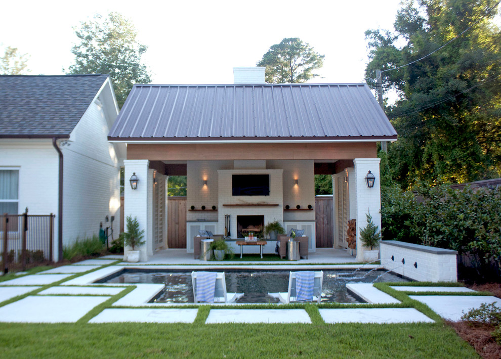 Design ideas for a beach style backyard garden in New Orleans.