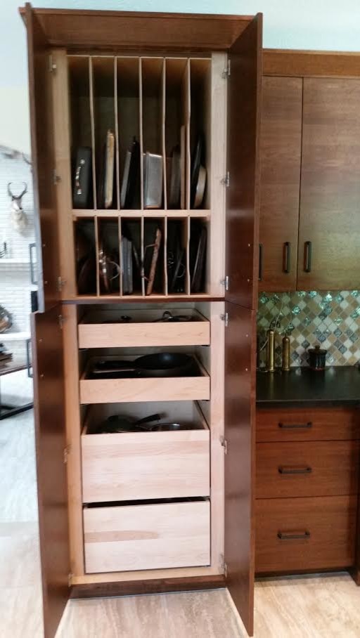 Inspiration for a mid-sized transitional light wood floor and beige floor open concept kitchen remodel in Houston with flat-panel cabinets, medium tone wood cabinets, solid surface countertops, multicolored backsplash, glass tile backsplash, stainless steel appliances and no island