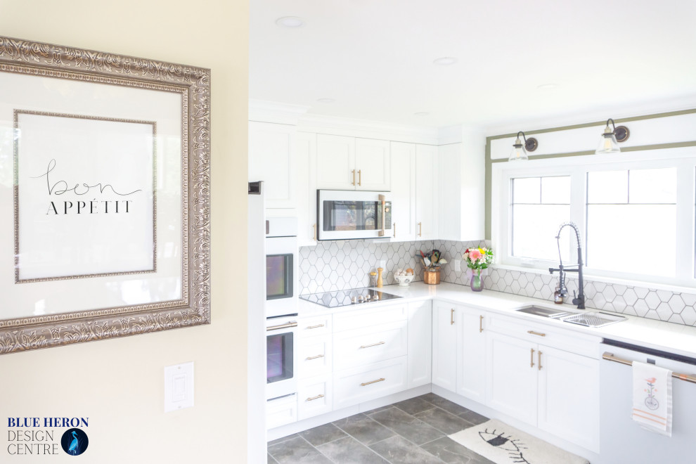 Eat-in kitchen - mid-sized transitional u-shaped laminate floor and gray floor eat-in kitchen idea with an undermount sink, shaker cabinets, white cabinets, quartz countertops, gray backsplash, ceramic backsplash, white appliances, no island and white countertops
