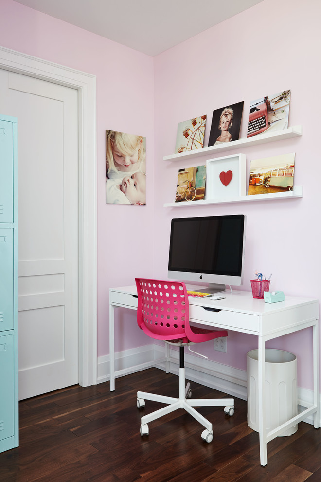 Design ideas for a transitional kids' study room for kids 4-10 years old and girls in Toronto with pink walls, brown floor and dark hardwood floors.