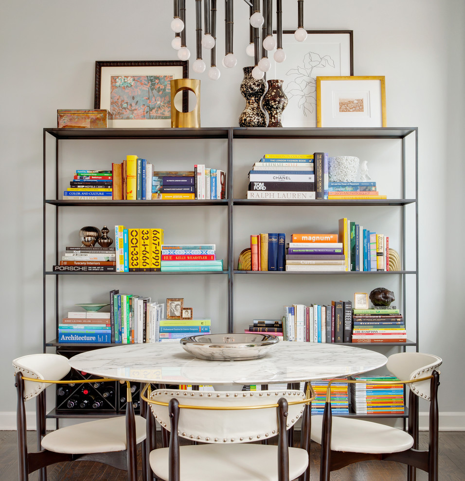 Example of a transitional dark wood floor dining room design in Chicago with white walls and no fireplace