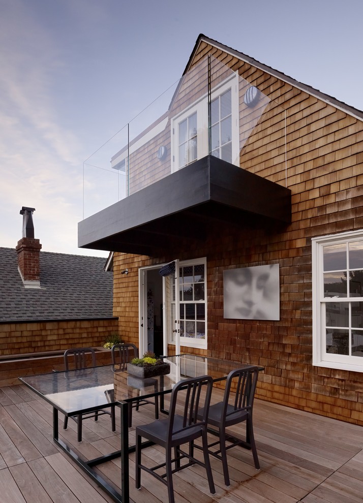 Mid-sized transitional deck in San Francisco with no cover.