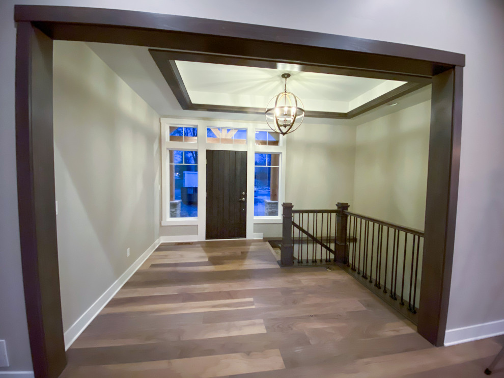 Inspiration for a transitional entryway remodel in Milwaukee