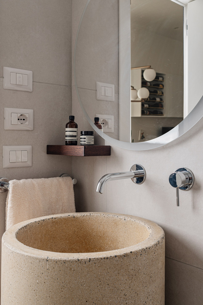 This is an example of a contemporary bathroom in Naples with a two-piece toilet, beige tile, porcelain tile, white walls, porcelain floors, wood benchtops and beige floor.