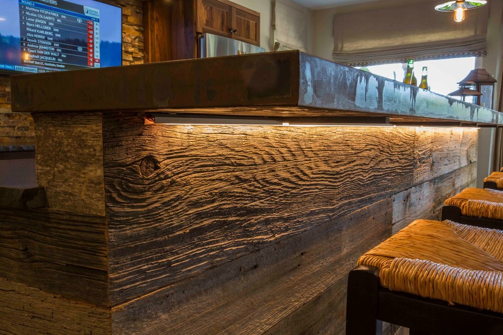 Example of a large mountain style galley ceramic tile home design design with an undermount sink, shaker cabinets, medium tone wood cabinets, solid surface countertops, multicolored backsplash and stone tile backsplash