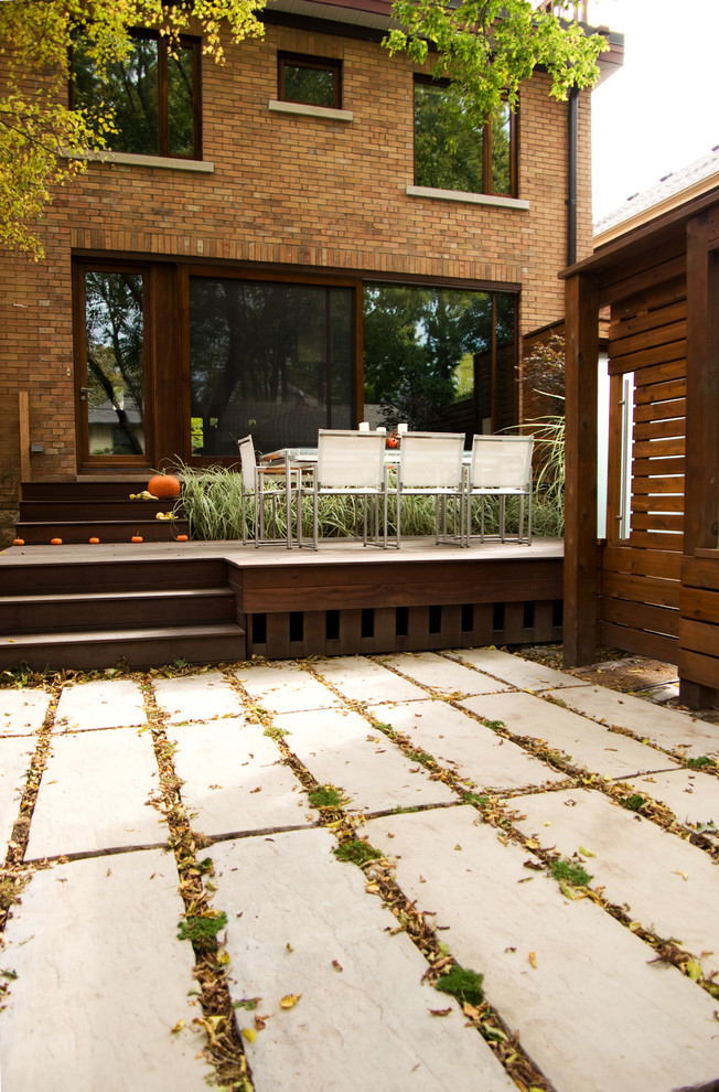 This is an example of a contemporary garden in Toronto with decking.