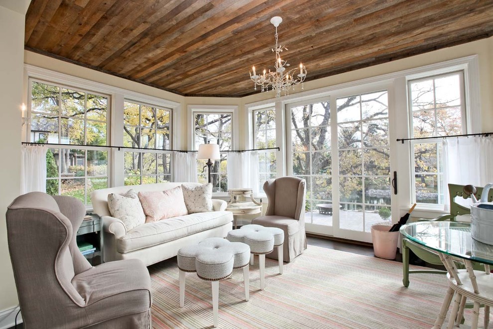 Inspiration for a large traditional living room in Minneapolis with beige walls.