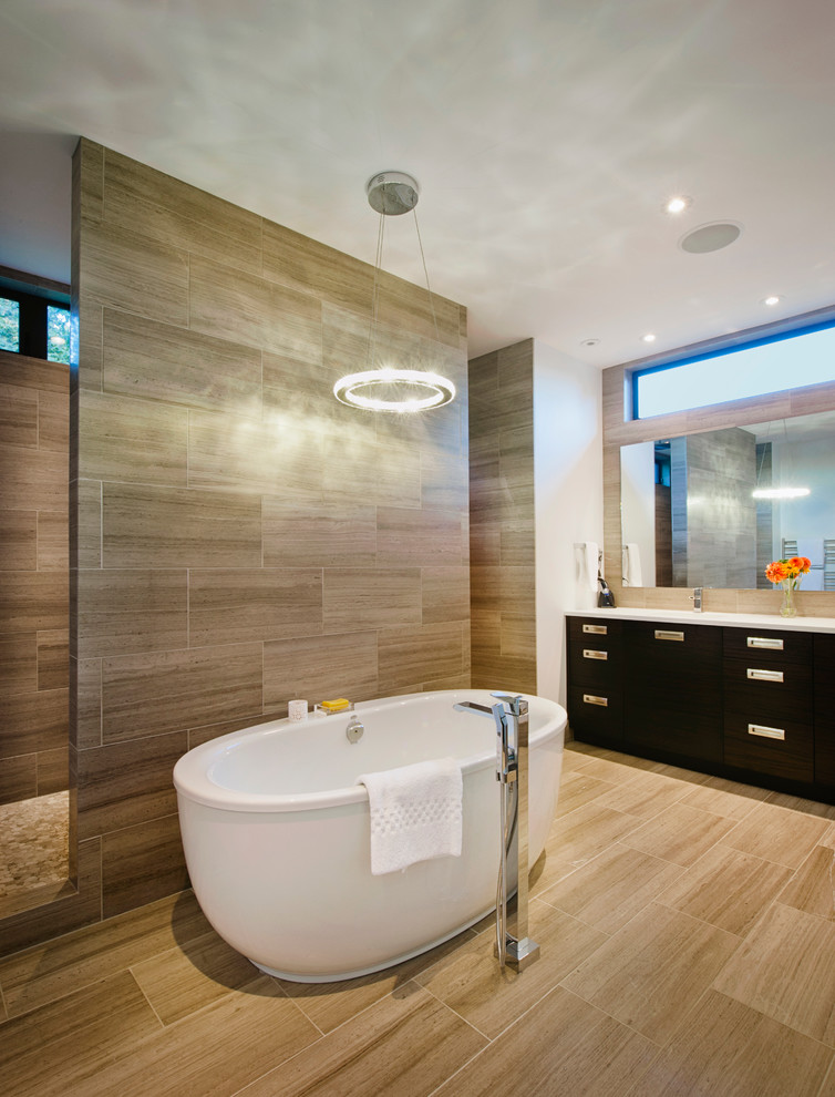 Inspiration for a contemporary bathroom in Vancouver with a freestanding tub.