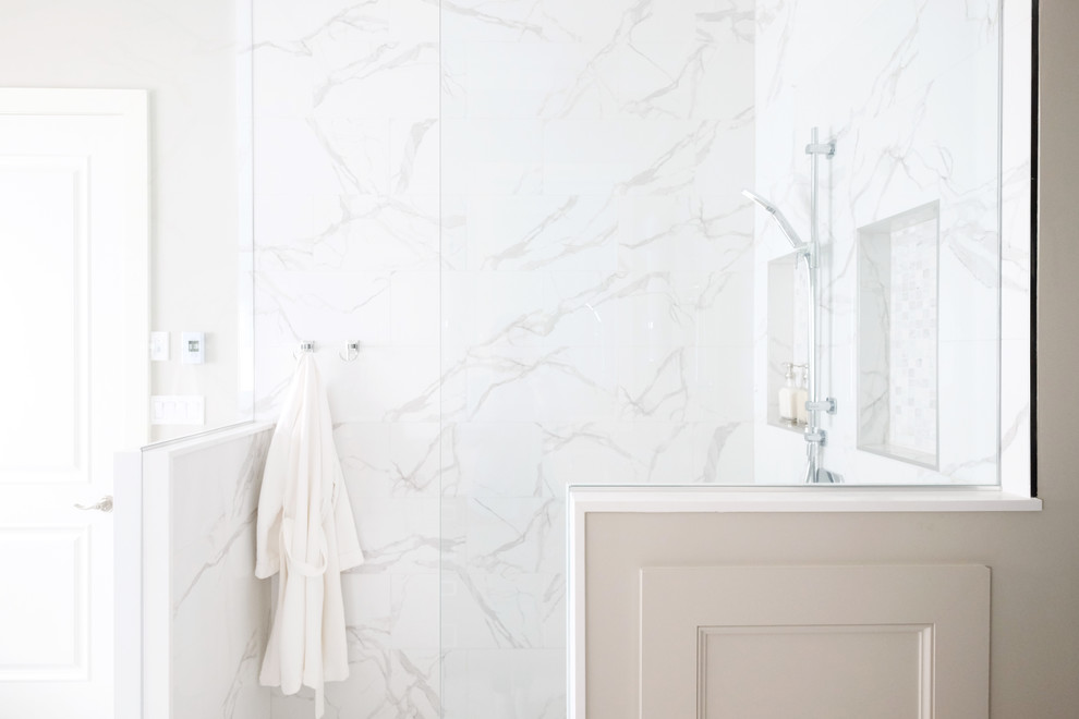 Example of a transitional master white tile and porcelain tile porcelain tile and white floor freestanding bathtub design in Toronto with shaker cabinets, medium tone wood cabinets, gray walls, an undermount sink, quartzite countertops and white countertops